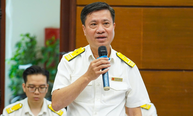 Ông Nguyễn Tiến Minh, Phó trưởng Thuế TP Hà Nội, phát biểu tại tọa đàm, ngày 8/7. Ảnh: Báo Tiền Phong