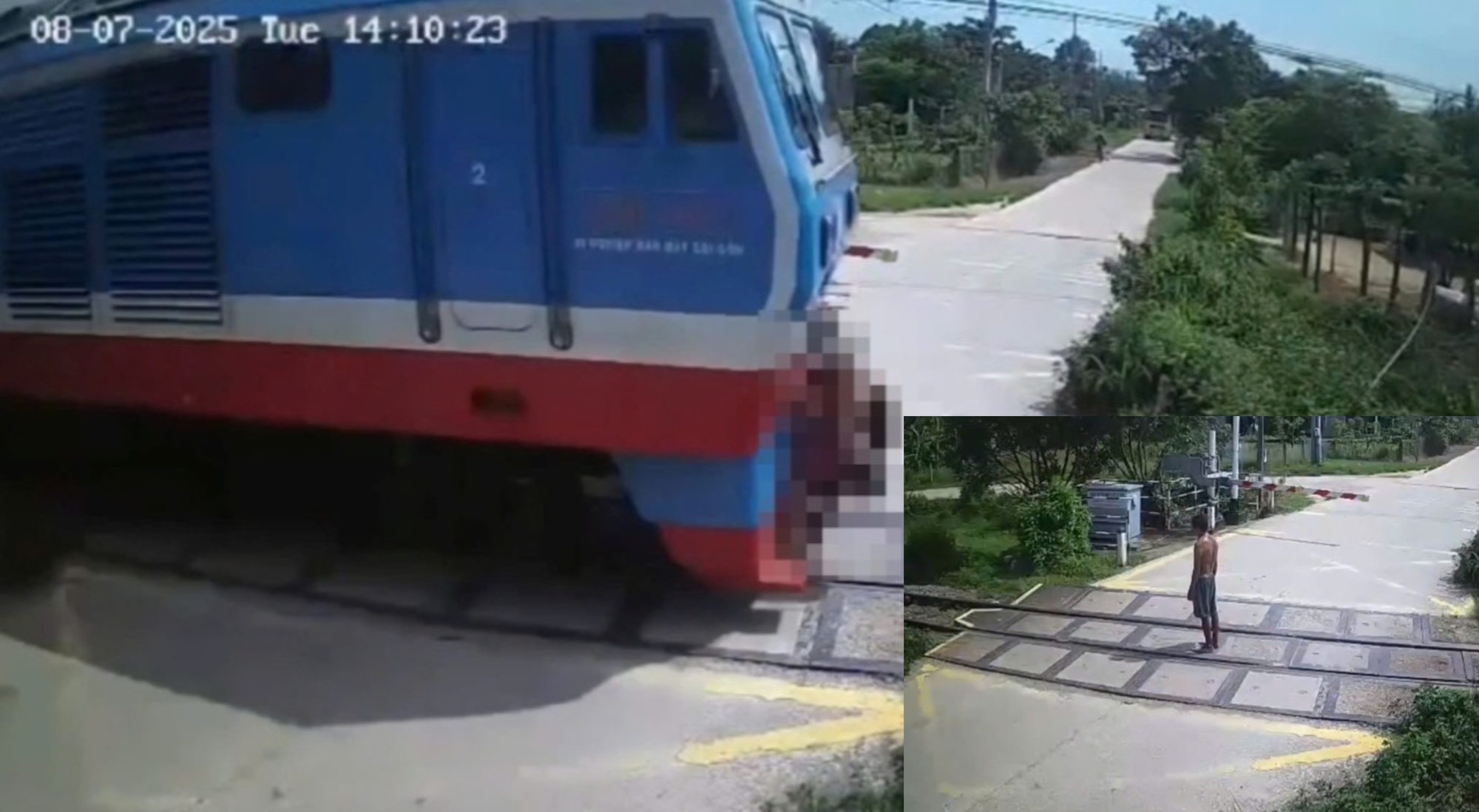 Camera ghi lại khoảnh khắc người đàn ông “đứng im khi tàu hỏa lao tới” - Ảnh 1.
